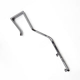 Black plastic tool with a angled handle on a white background