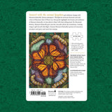 Puzzle box with butterfly design on a green patterned background