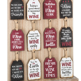 Decorative wall art with wine-themed sayings on wooden tags.