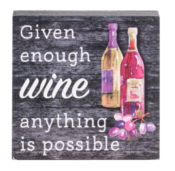 wooden block with painting of wine bottles and a bunch of grapes next to a phrase stating "given enough wine anything is possible" on a clear background