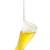 Hanging glass shaped like a beer mug filled with yellow liquid on a white background