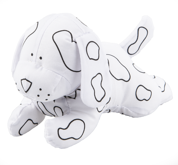 White dog plush toy with black patterns on a white background