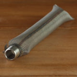 Metal screen with a screw in end on a wooden background