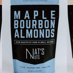 Packaging of Maple Bourbon Almonds from Nat's Nuts on a light gray background