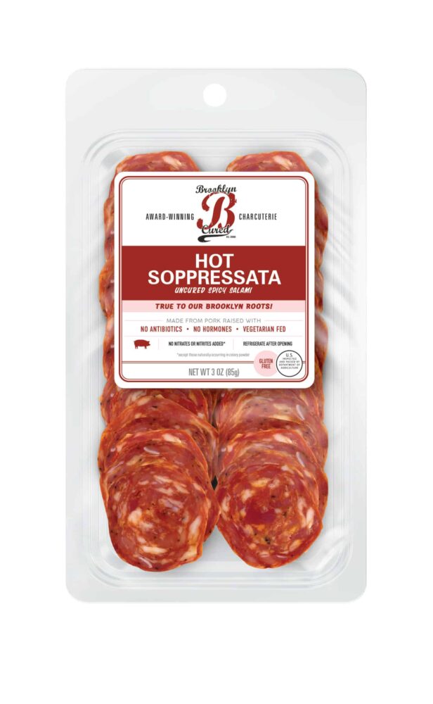 cured meats in a package with red and white label branding on a white background