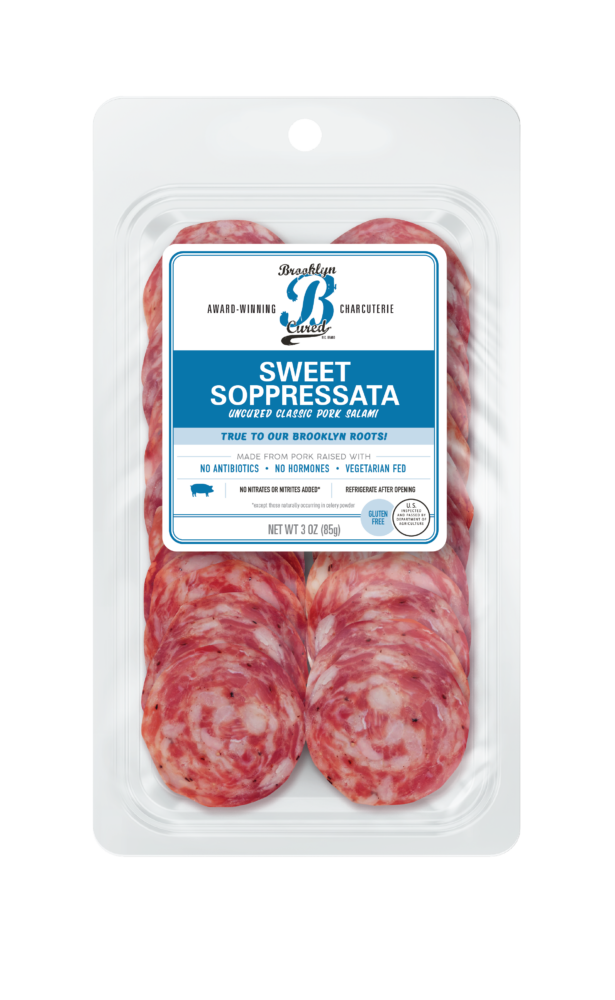 Cured meats with a blue and white label on a clear background