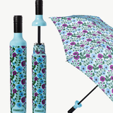 Floral-patterned umbrella with open and closed positions on a white background