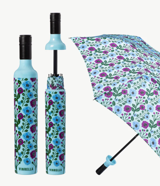 Floral-patterned umbrella with open and closed positions on a white background