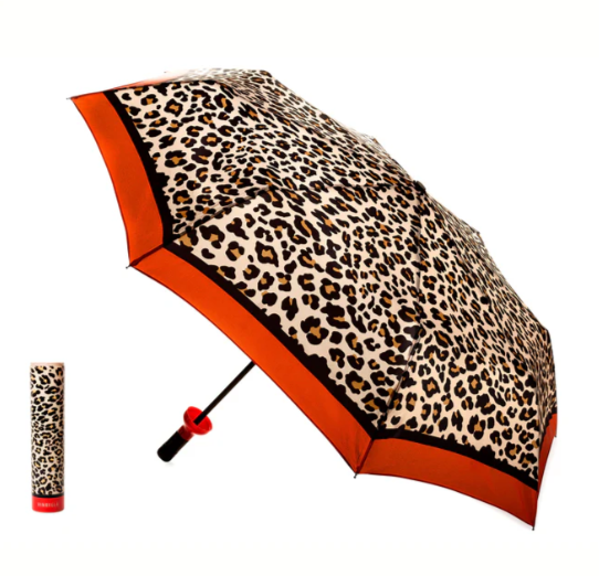 Leopard print umbrella with orange trim on a white background