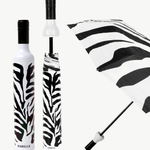 Zebra-patterned umbrella with white handle and base, displayed open and closed.