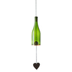 Green glass bottle hanging from a chain with a heart-shaped object at the bottom on a white background