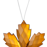 Decorative leaf ornament with a geometric design on a white background