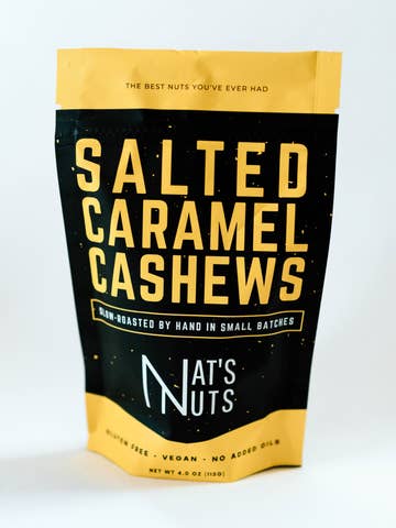 Bag of salted caramel cashews with 'At's Nuts' branding on a white background