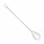White spoon on a white background
