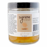 Jar of Supreme mother of Vinegar with a label on a white background