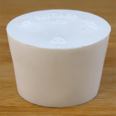 Solid rubber stopper on a wooden background