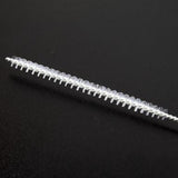 Siphon tube brush on a black background