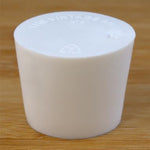 Solid rubber stopper on a wooden background