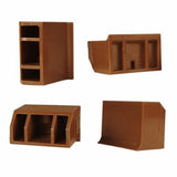 Four brown plastic corker jaws on a white background