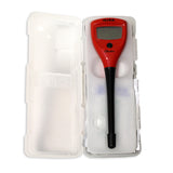 Red measuring device with black probe in a transparent white storage container on a white background.