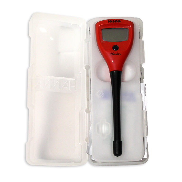 Red measuring device with black probe in a transparent white storage container on a white background.