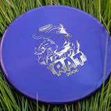 Purple Rat disc golf disc with white text and graphics on grass