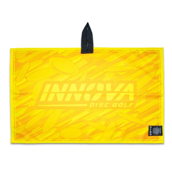Yellow Innova Disc Golf towel with black strap on a white background