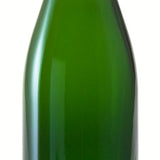 Green glass bottle on a white background