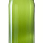 Green glass bottle on a white background