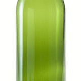 Green glass bottle on a white background