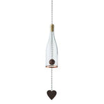 Wine bottle wind chime hanging decoration with a heart-shaped object on a white background
