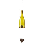 Yellow glass wine bottle wind chime with a heart-shaped weight hanging on a white background